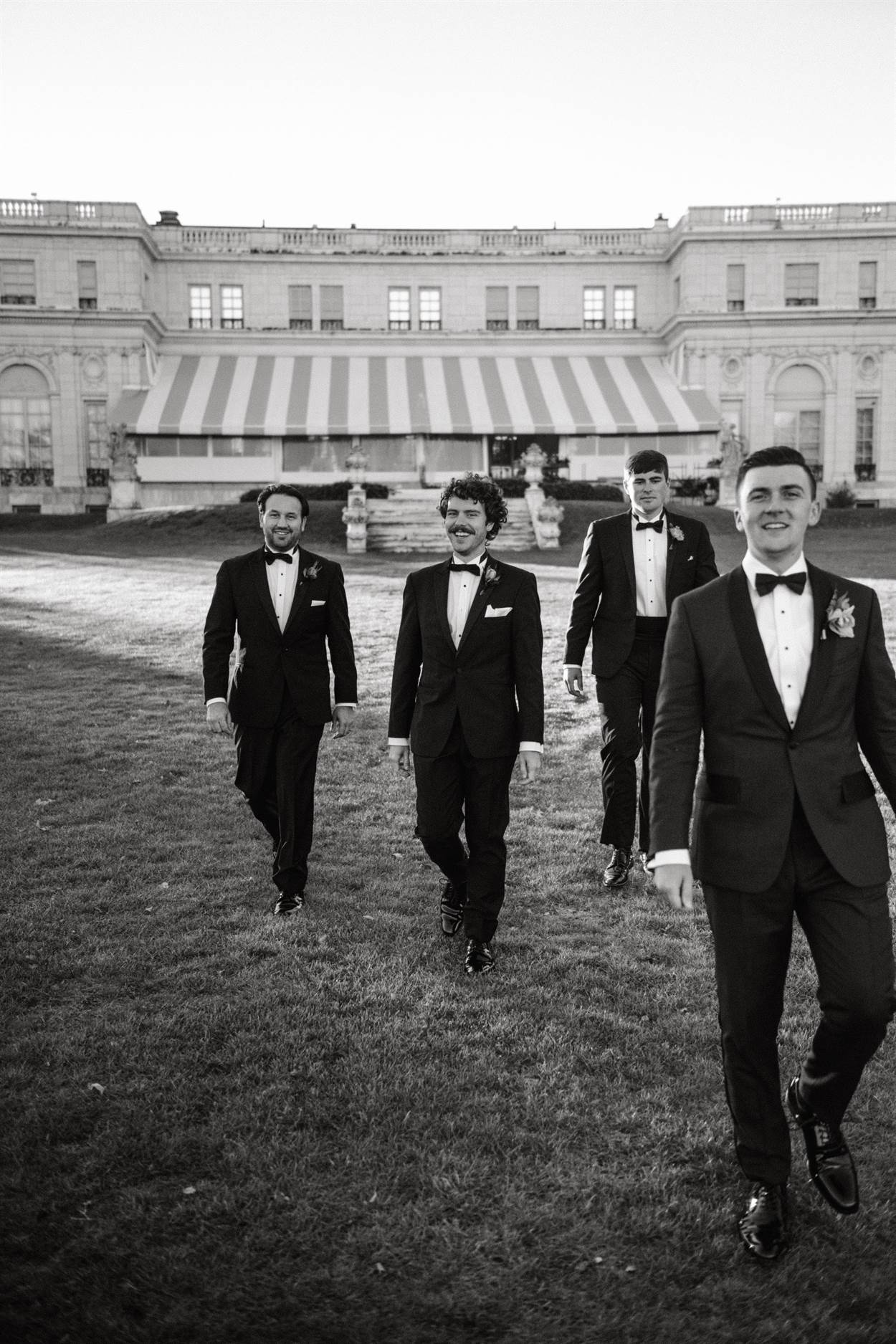 Sorek groomsmen in coordinated tuxedos